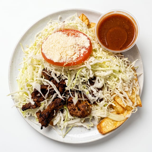 Tajadas Con Carne Asada.